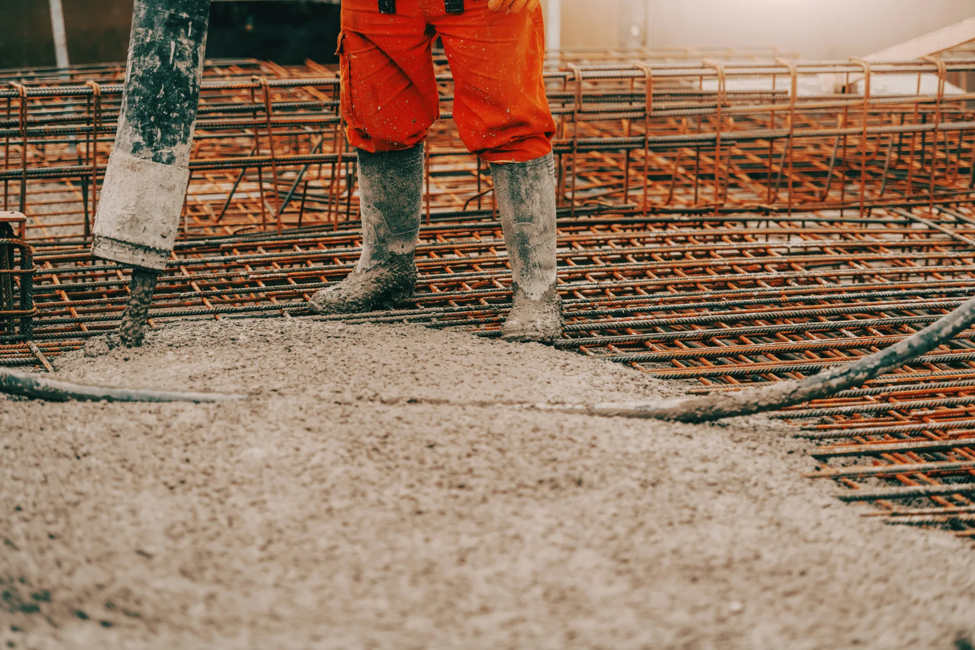 concrete pump operator placing concrete with a coiled hose in Portland
