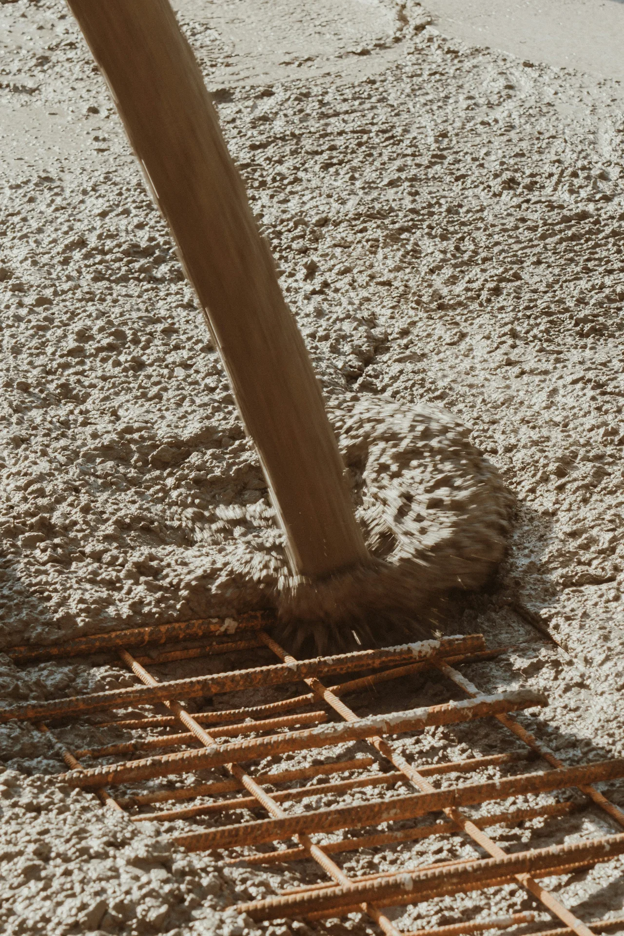 Laticrete NXT being poured on a Portland substrate