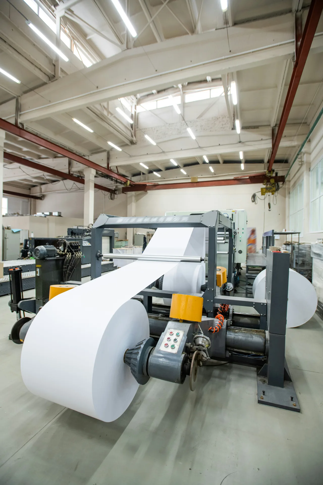 industrial concrete floor under a Portland printing press