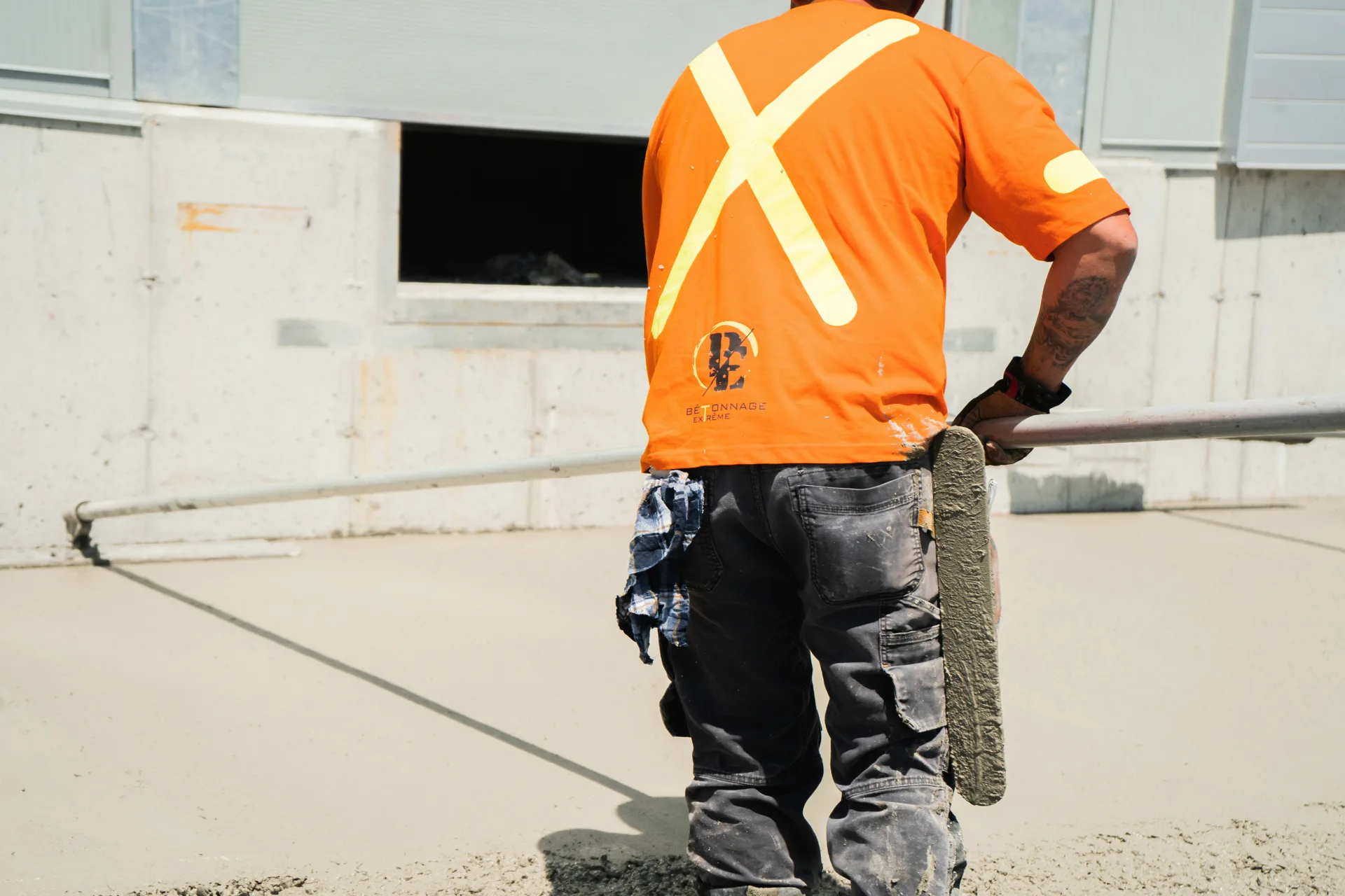 finisher working an Ardex application on a Portland floor
