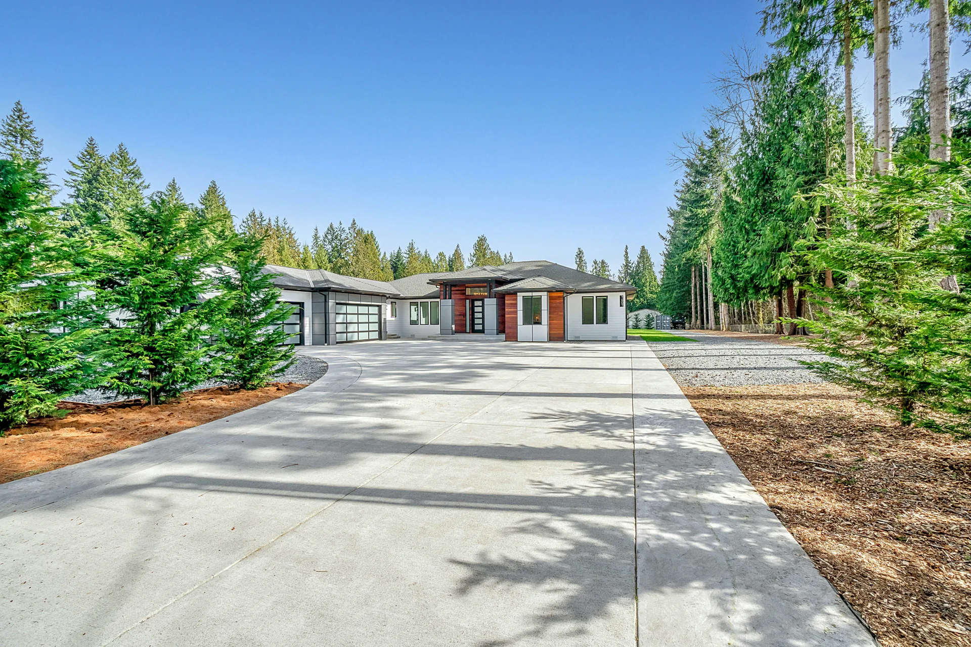 long coloured concrete driveway at a Portland home