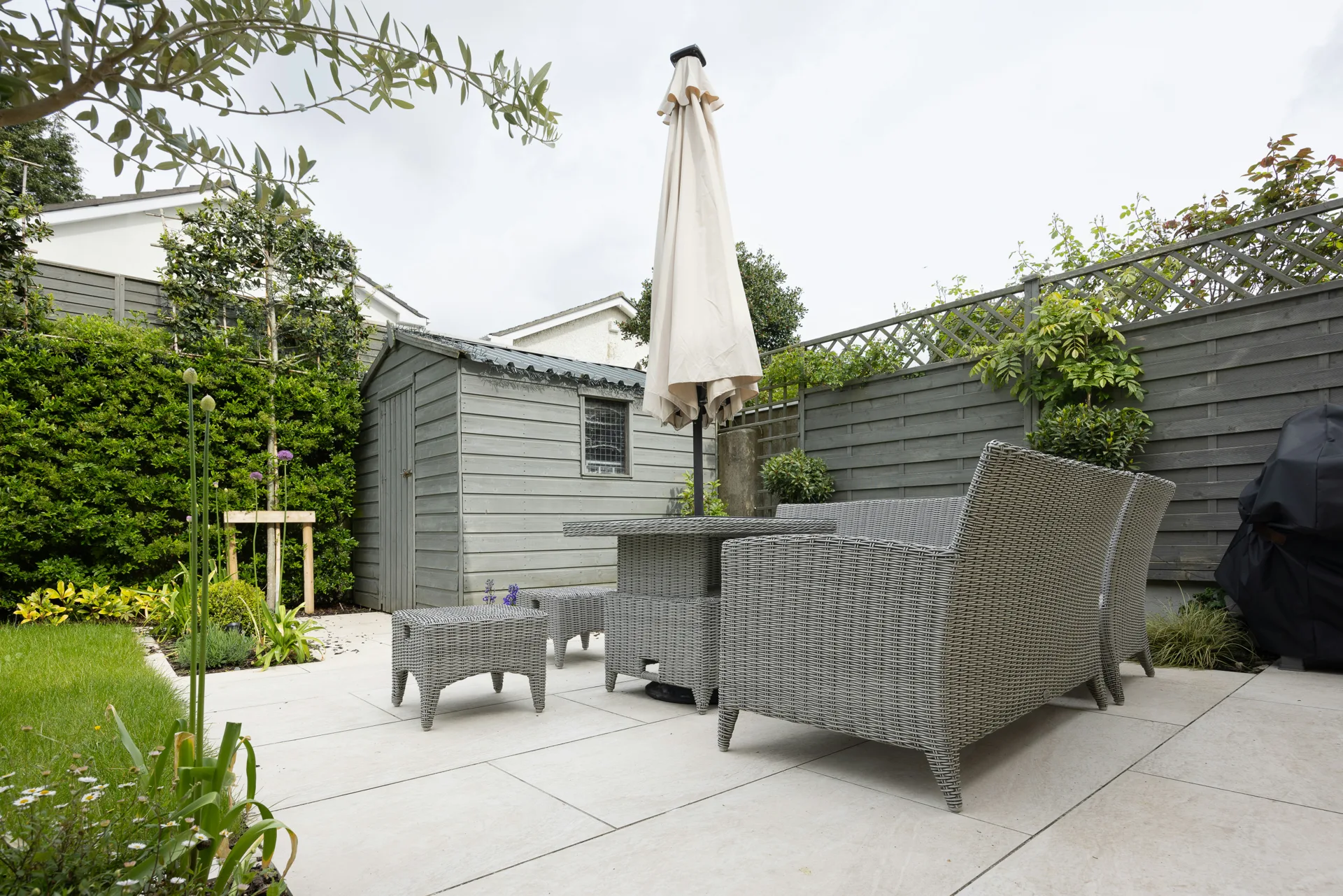 plain concrete patio in a Portland garden setting
