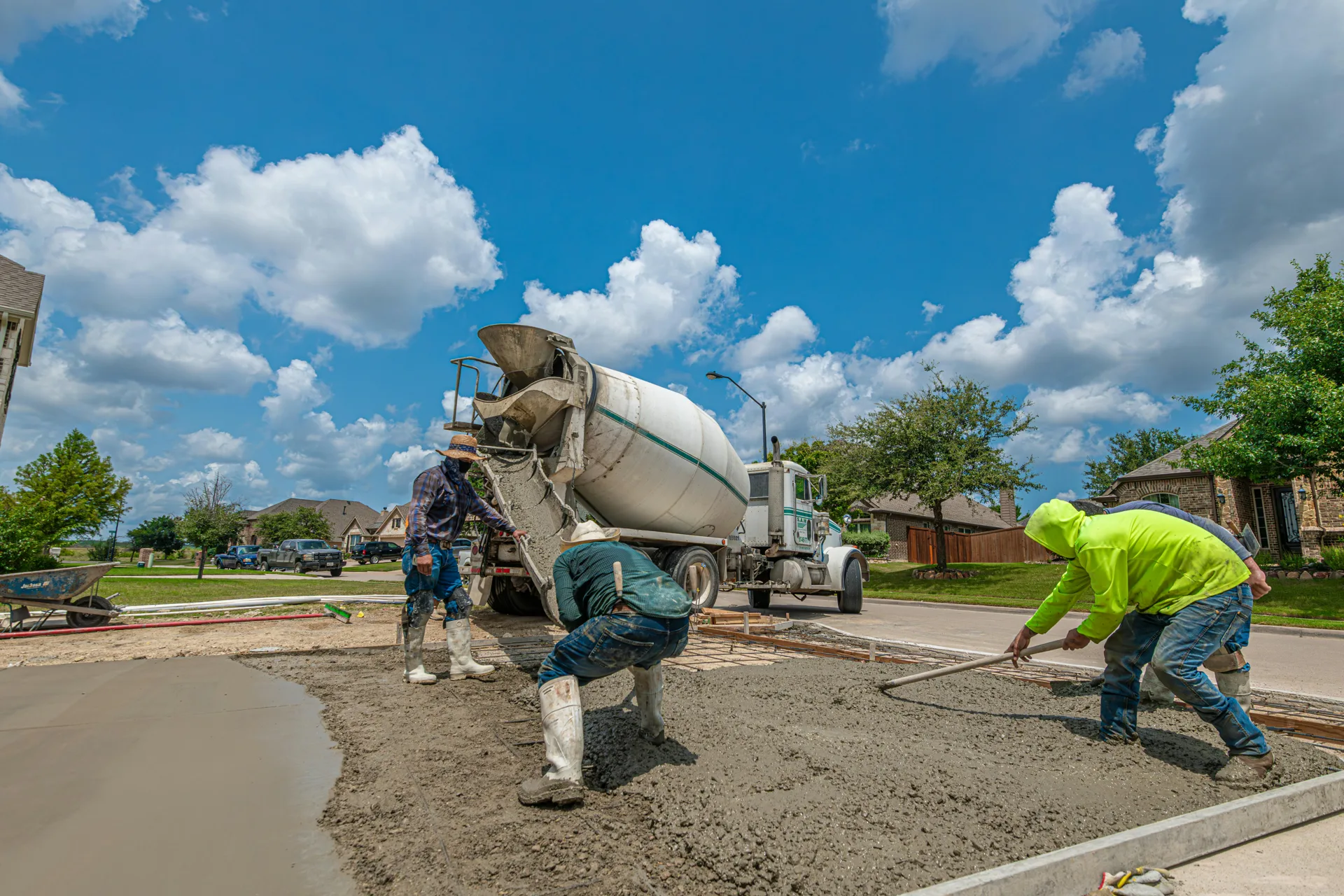 Portland concrete crew finishing a fresh driveway pour