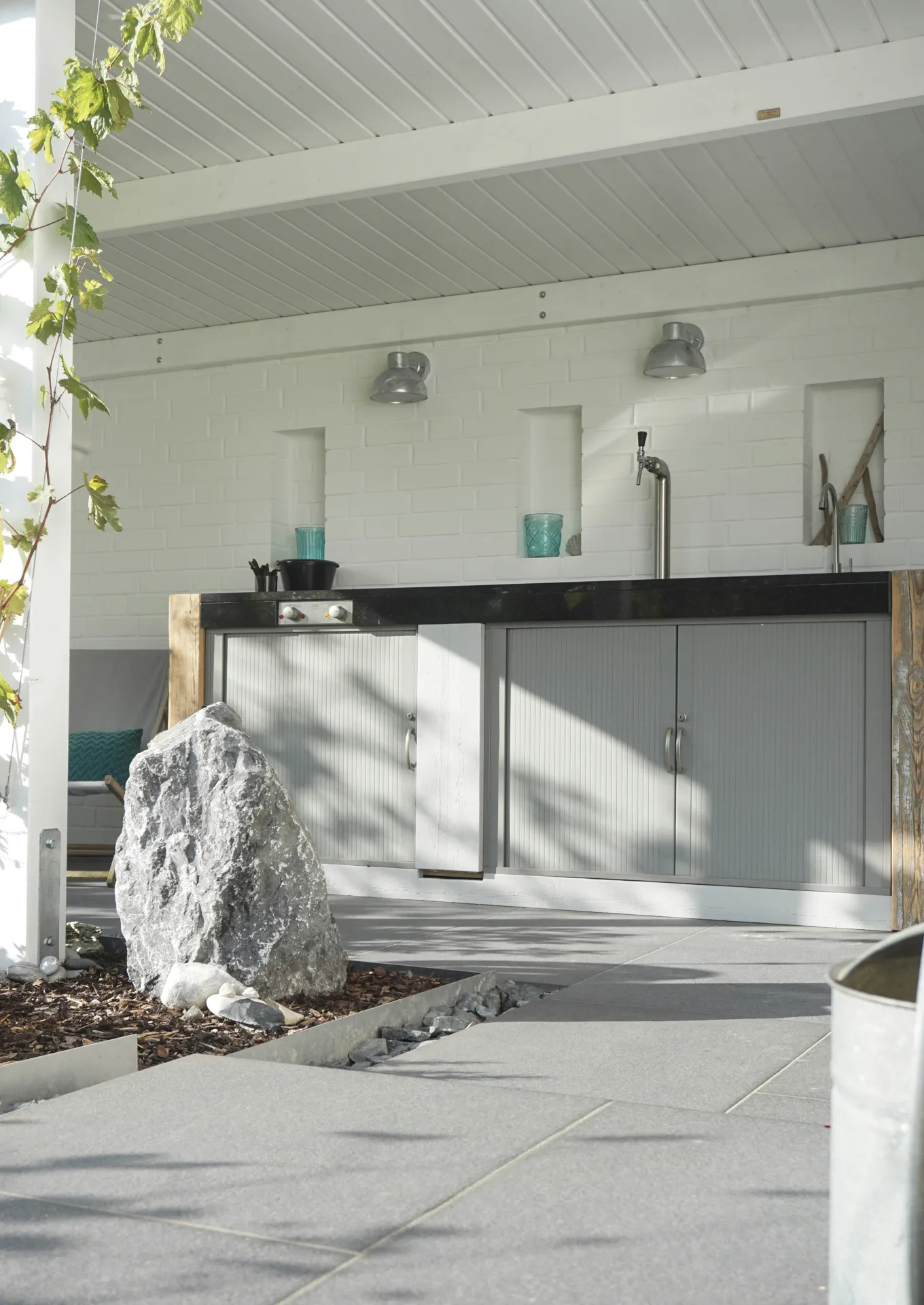 outdoor concrete countertop around a BBQ surround at a Portland home