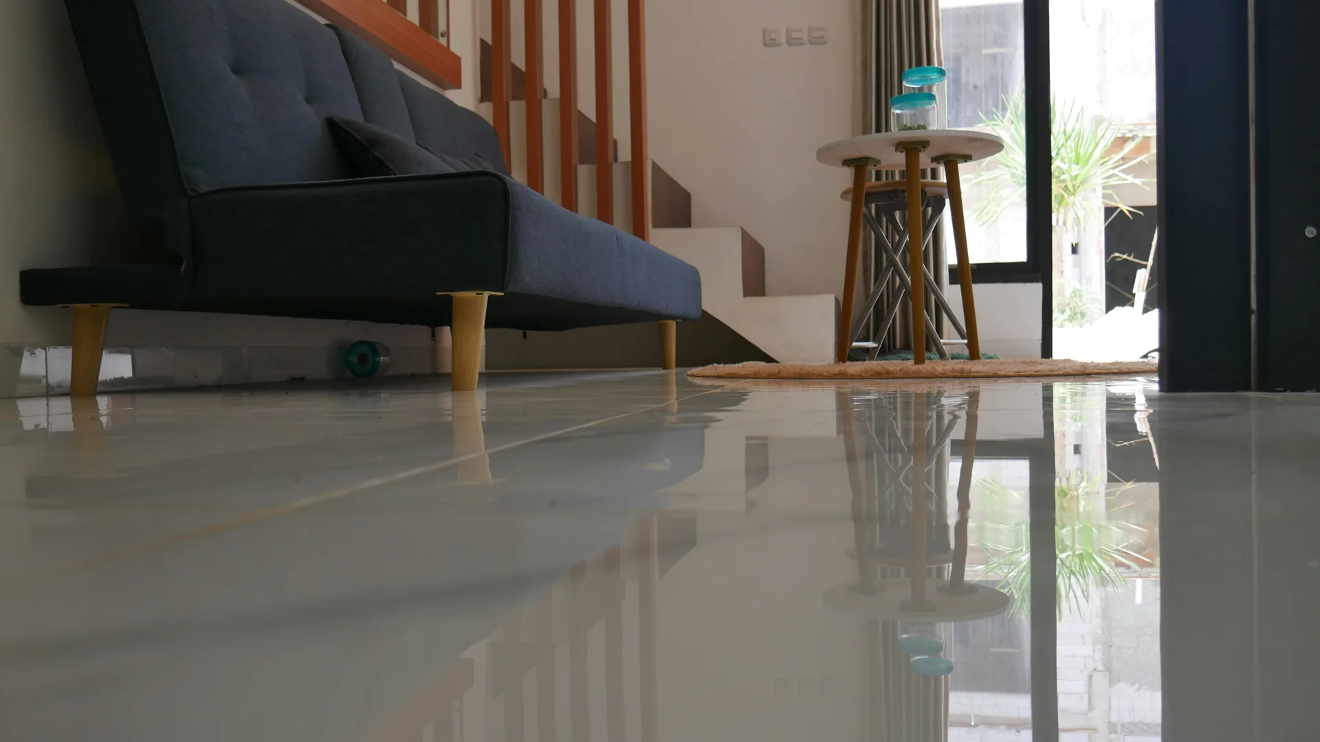polished concrete floor reflecting light in a Portland living room