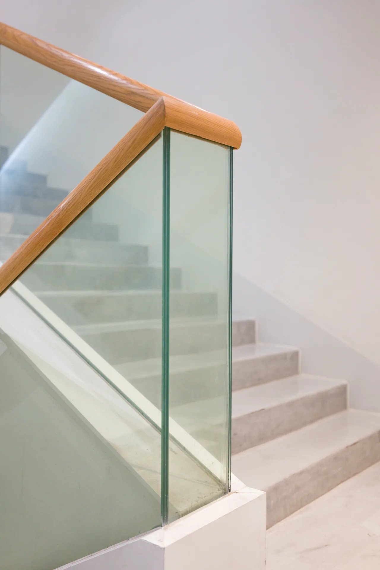 concrete walkout-basement staircase rising from cut to grade