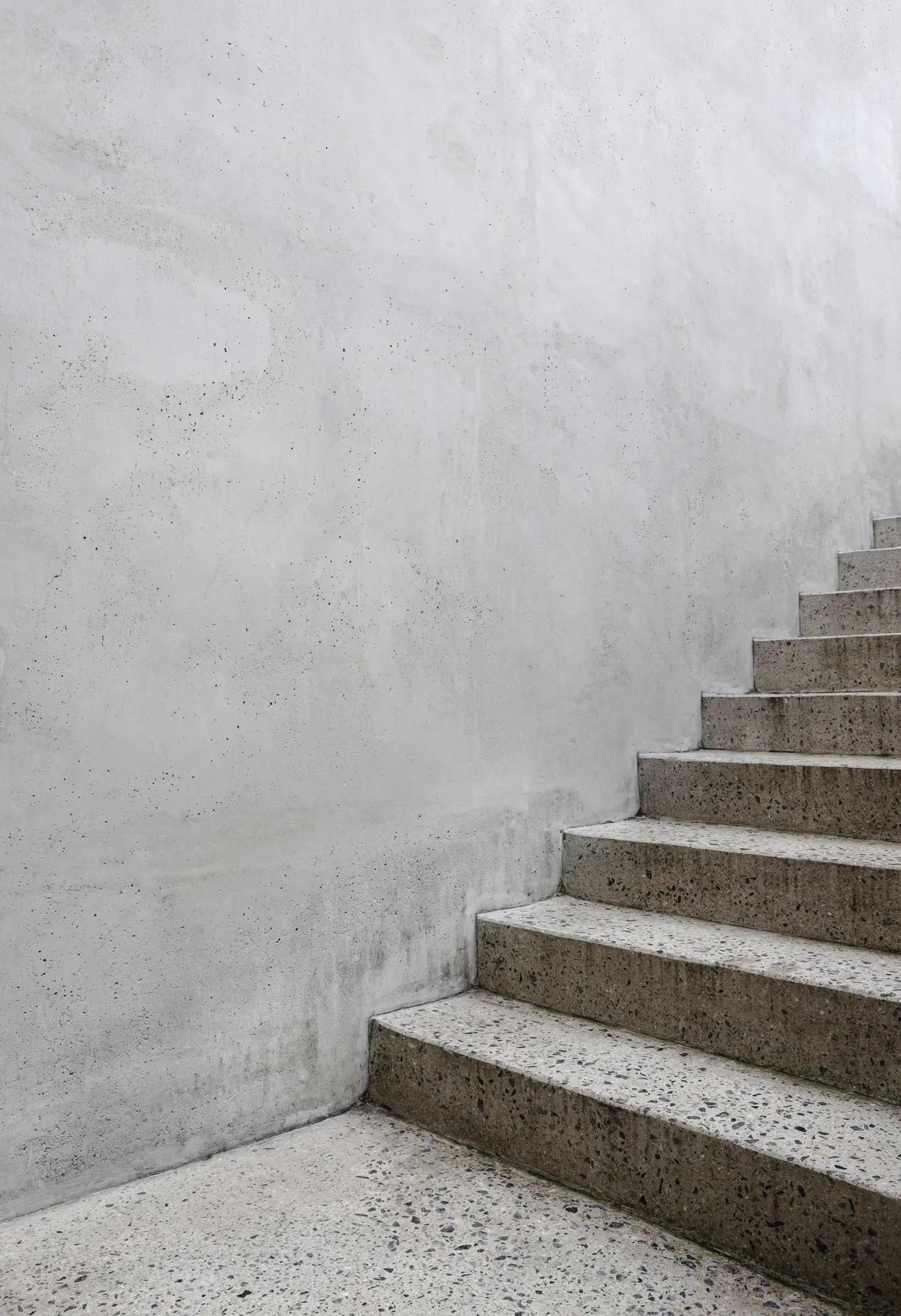 finished concrete front entry steps at a Portland home in winter